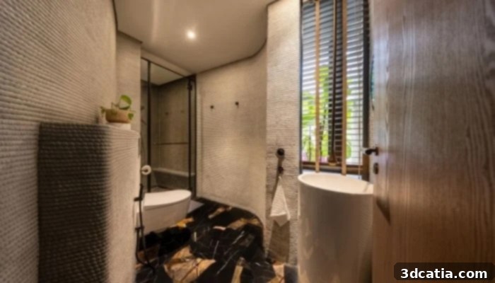 A modern bathroom in the QR3D house, showcasing 3D printed wall textures and contemporary design elements. (Credit: STUDIOWONGS)