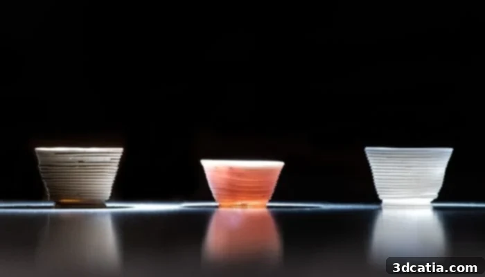 Glass cups printed using the low-temperature process developed by MIT Lincoln Laboratory, showcasing the potential of this innovative manufacturing method.