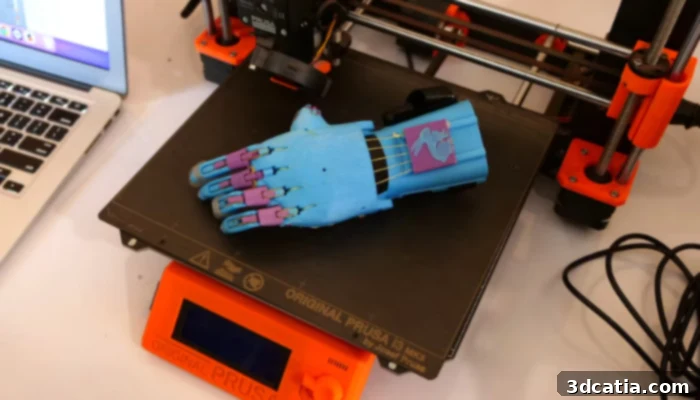Students creating a 3D-printed prosthetic hand for their classmate