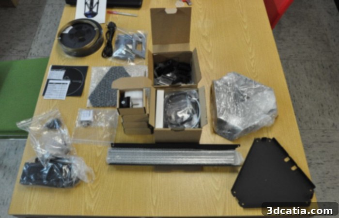 MicroDelta Rework 3D Printer Kit components laid out for assembly
