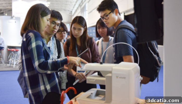 IN(3D)USTRY Third Edition The 3D Printing Ecosystem Summit 6 Panoramic view of the IN(3D)USTRY exhibition hall, filled with visitors and exhibits.