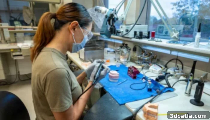 Dental lab technician prepares dental restorations at Maxwell Air Force Base